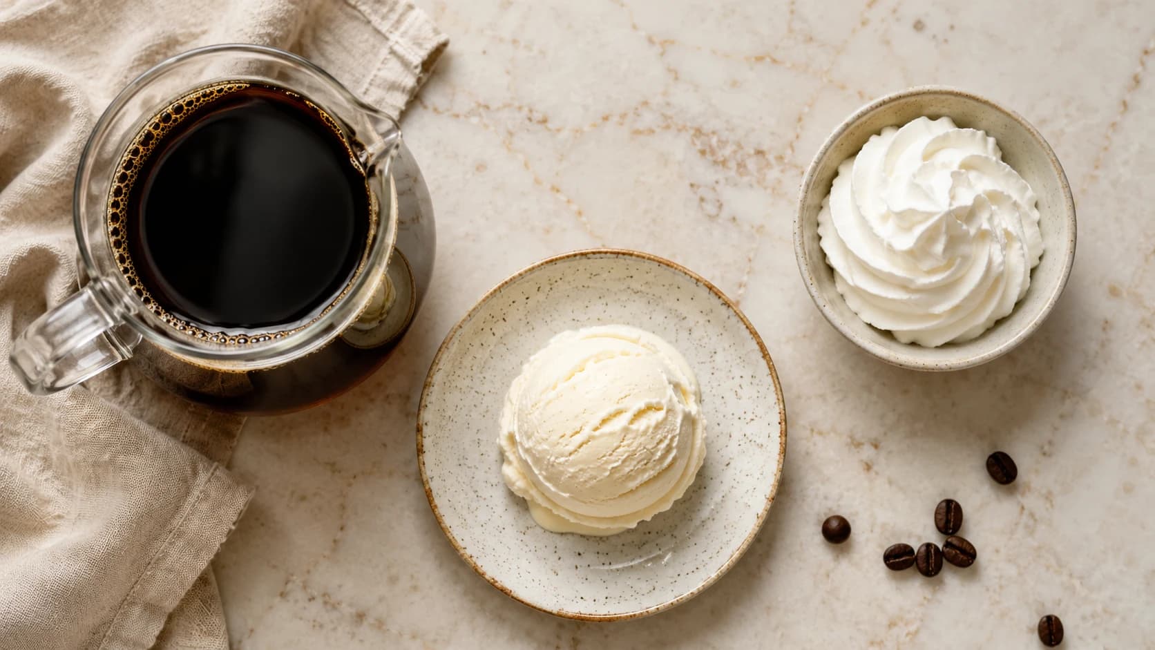 Coffee float ingredients with brewed coffee, vanilla ice cream, whipped cream, and chocolate
