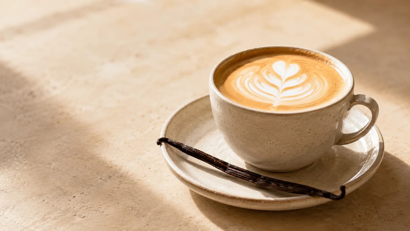 Hot vanilla latte made with espresso, steamed milk, and vanilla syrup