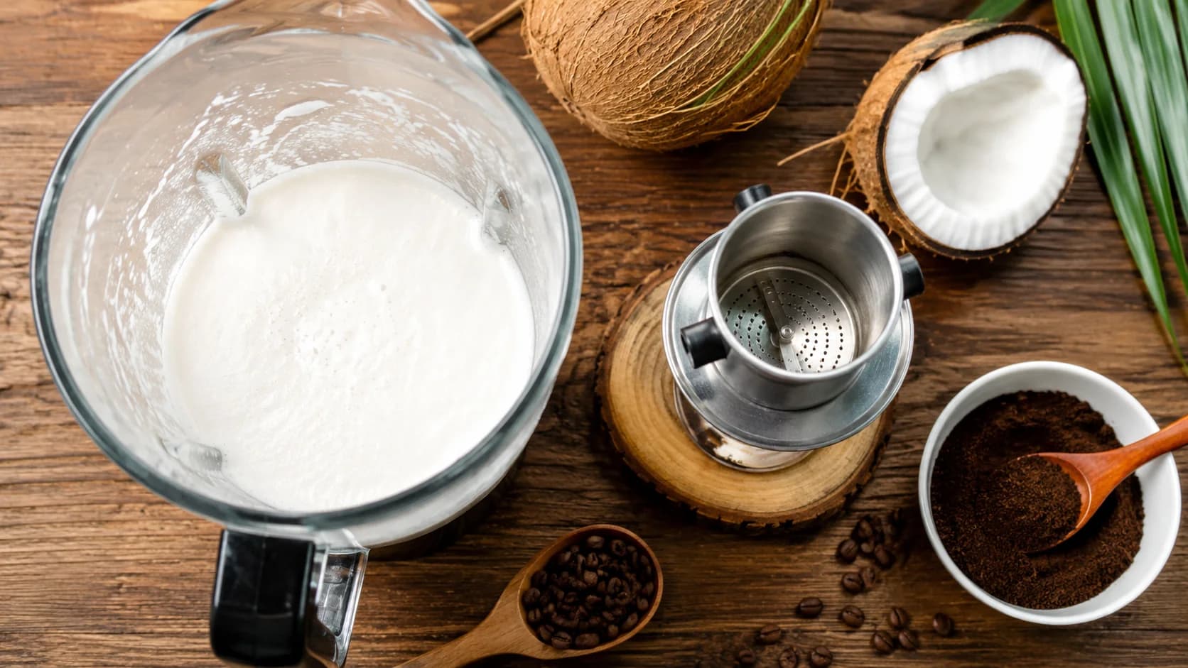Vietnamese egg coffee cream being whisked with egg yolk and condensed milk